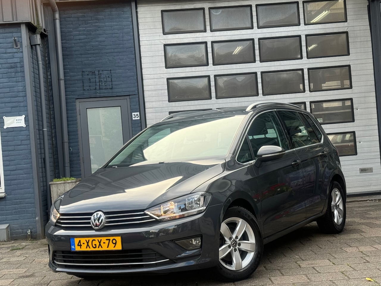 Volkswagen Golf Sportsvan - 1.2 TSI Highline | Clima | Cruise | Navi | N.A.P - AutoWereld.nl