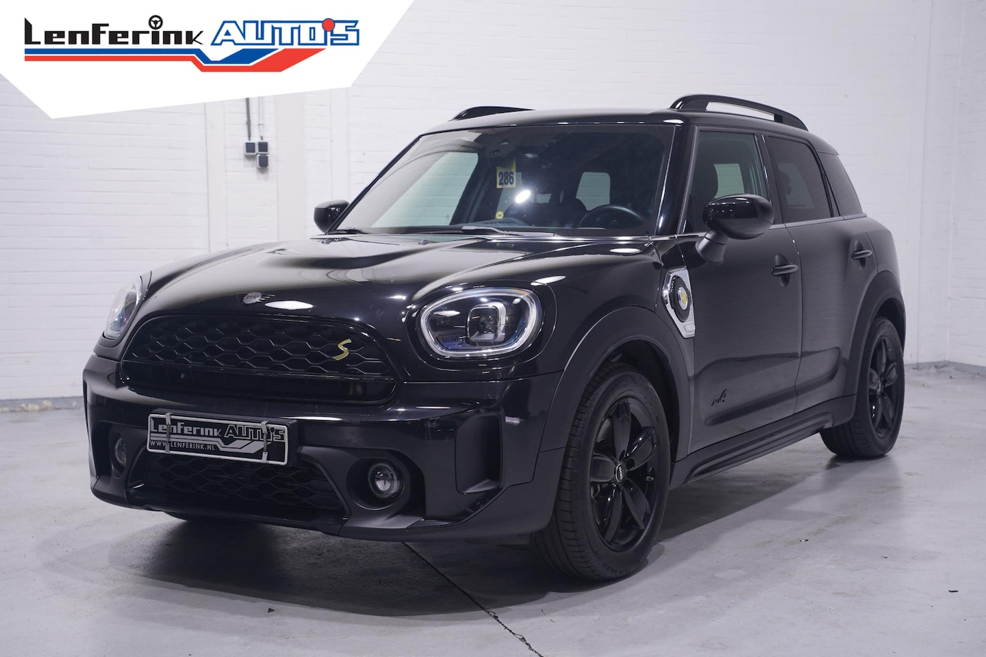 MINI Countryman - Cooper SE ALL4 Classic Trim SOH 94% Apple Carplay Navi Verwarmde sportstoelen lederen bekl - AutoWereld.nl