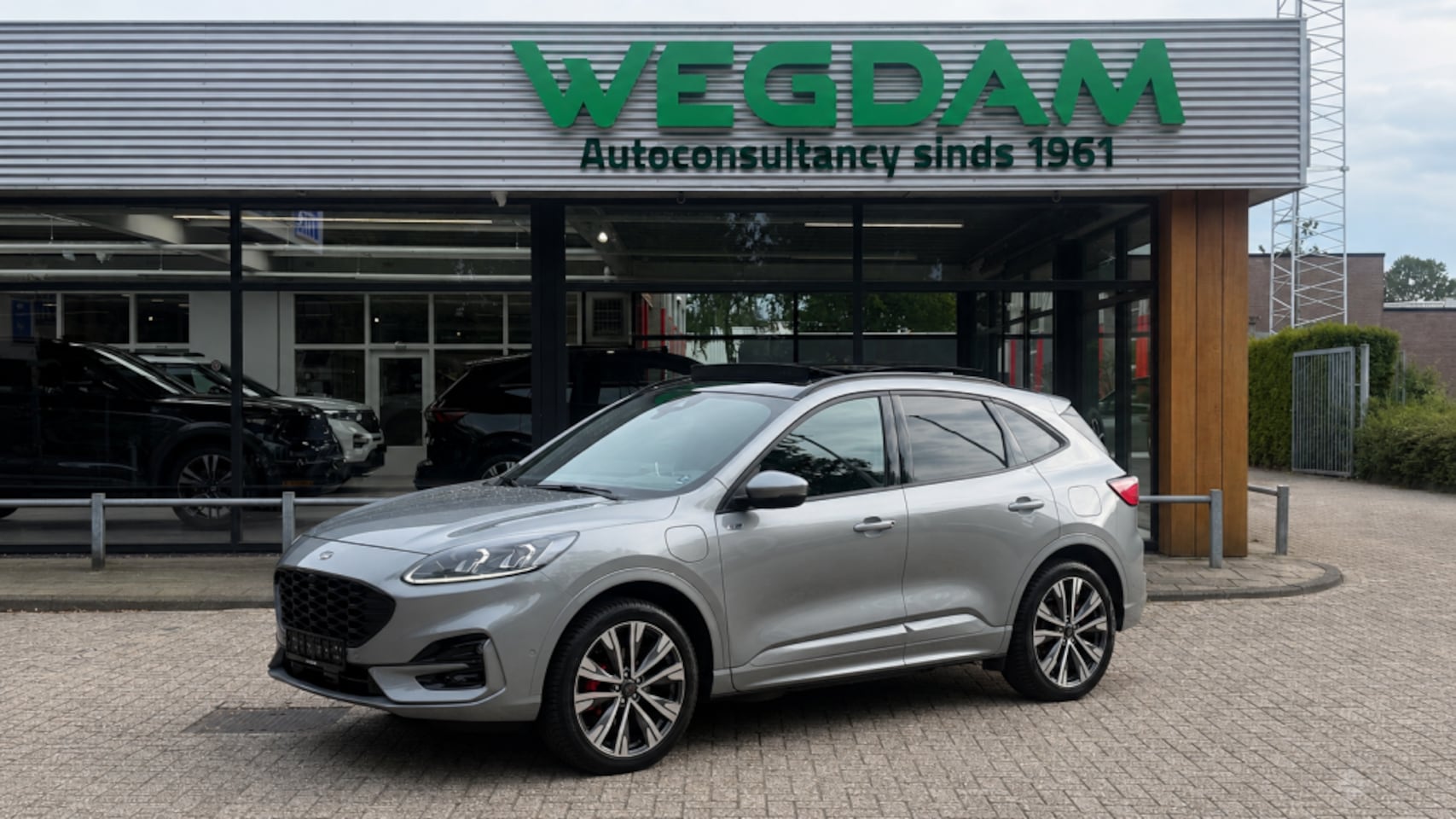 Ford Kuga - 2.5 PHEV ST-LINE X / FULL OPTIONS AGR-stoelen / All weath. band 20inch - AutoWereld.nl