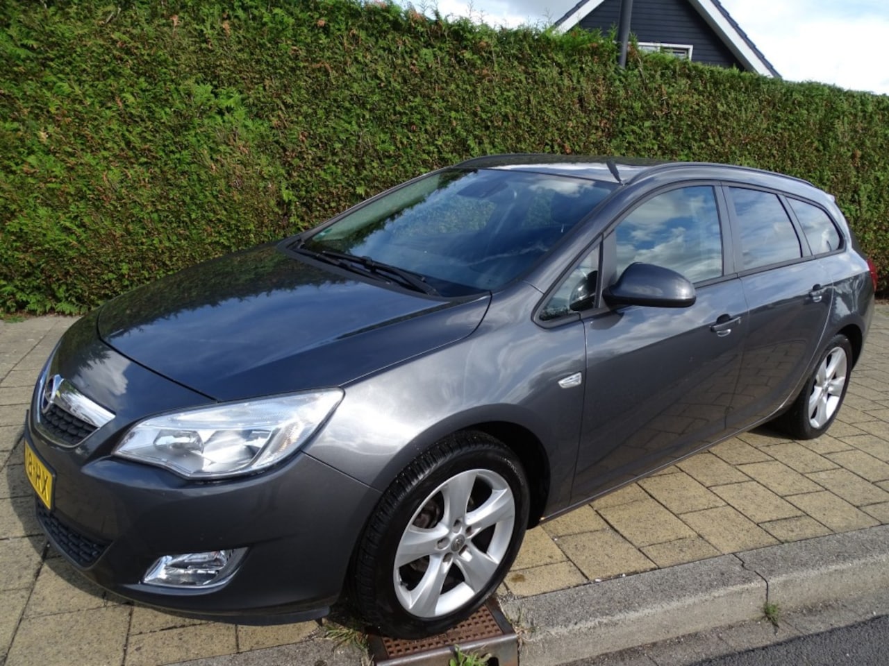 Opel Astra Sports Tourer - 1.4 TURBO SPORTS TOURER-Airco-Cruise-Lmv-Pdc-Aux - AutoWereld.nl