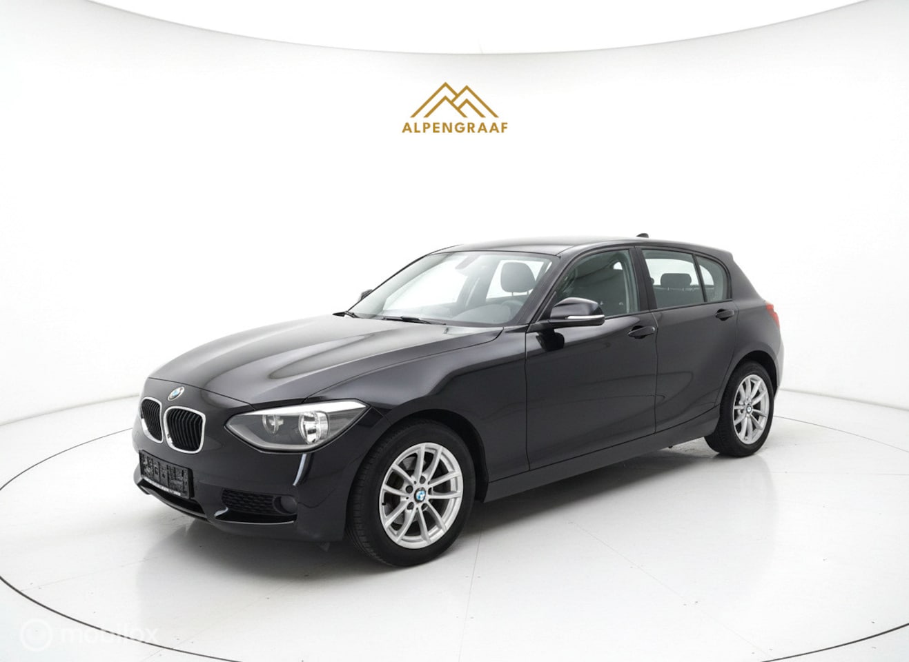 BMW 1-serie - 114i Executive Navi PDC 2e eigenaar 2013 - AutoWereld.nl