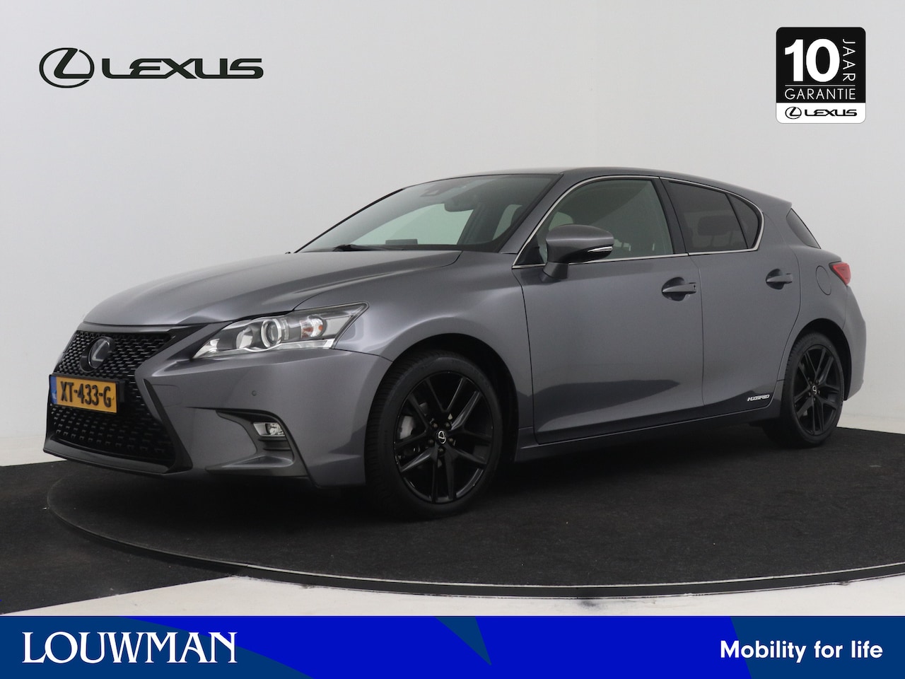 Lexus CT 200h - Sport Edition Mercury Grey metallic Black/ Dark Rose stof - AutoWereld.nl