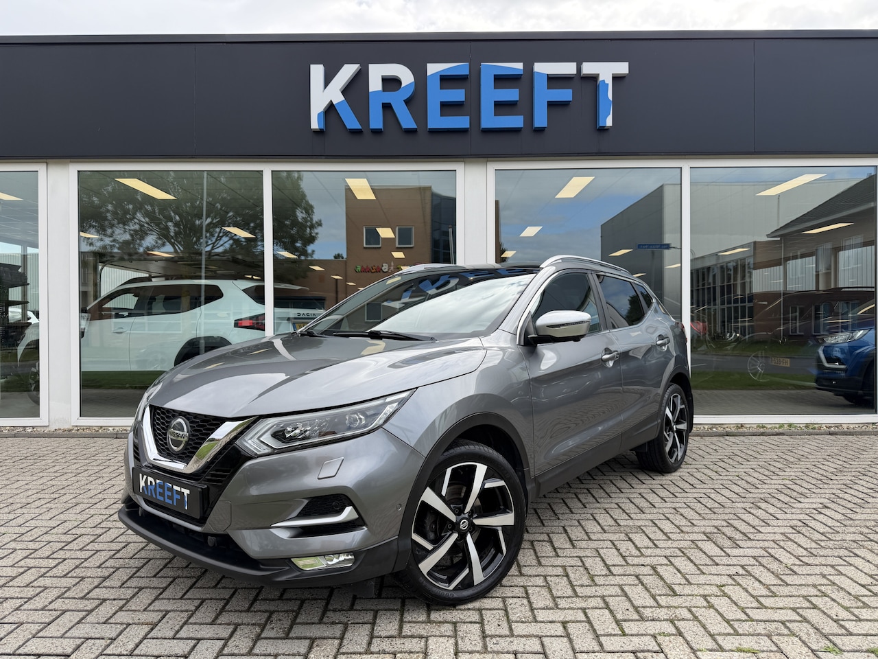 Nissan Qashqai - 1.3 DIG-T Tekna + Trekhaak | Panorama - AutoWereld.nl