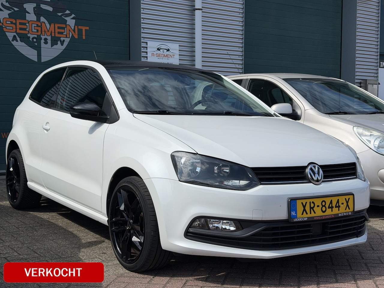 Volkswagen Polo - 1.2 TSI First Edition / Parelmoer / 17" LMV / zwart dak / Clima - AutoWereld.nl