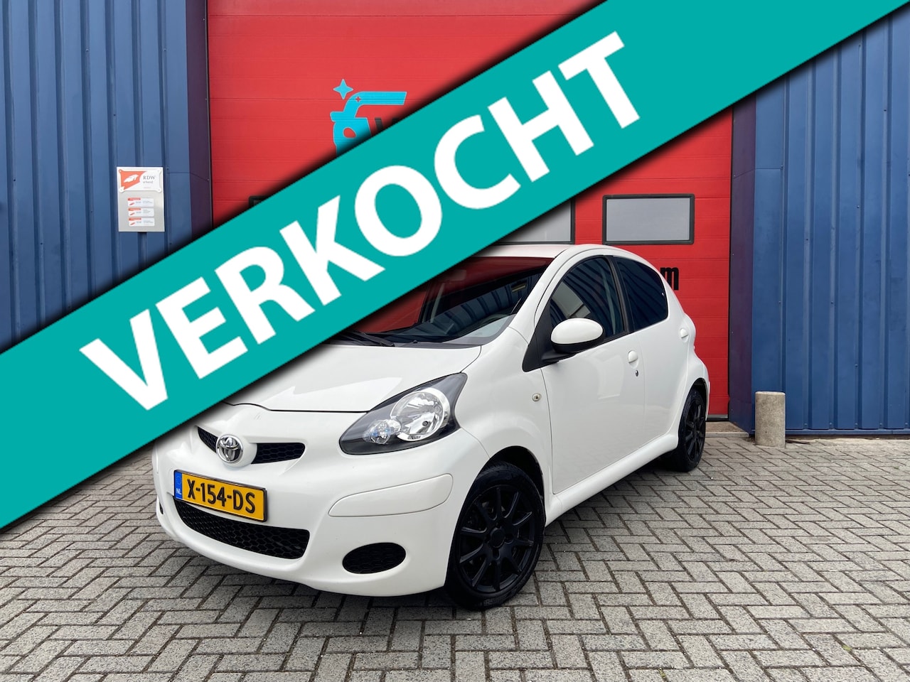 Toyota Aygo - 1.0-12V Aspiration Red |Trekhaak|Airco|Carplay - AutoWereld.nl