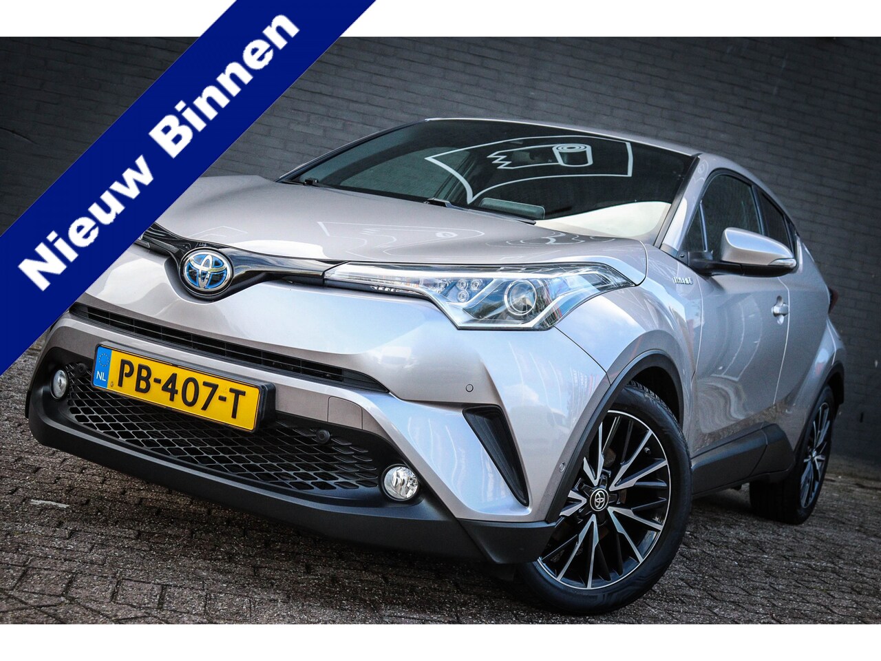 Toyota C-HR - 1.8 Hybrid Executive Net binnen-Nu al te bezichtigen - AutoWereld.nl