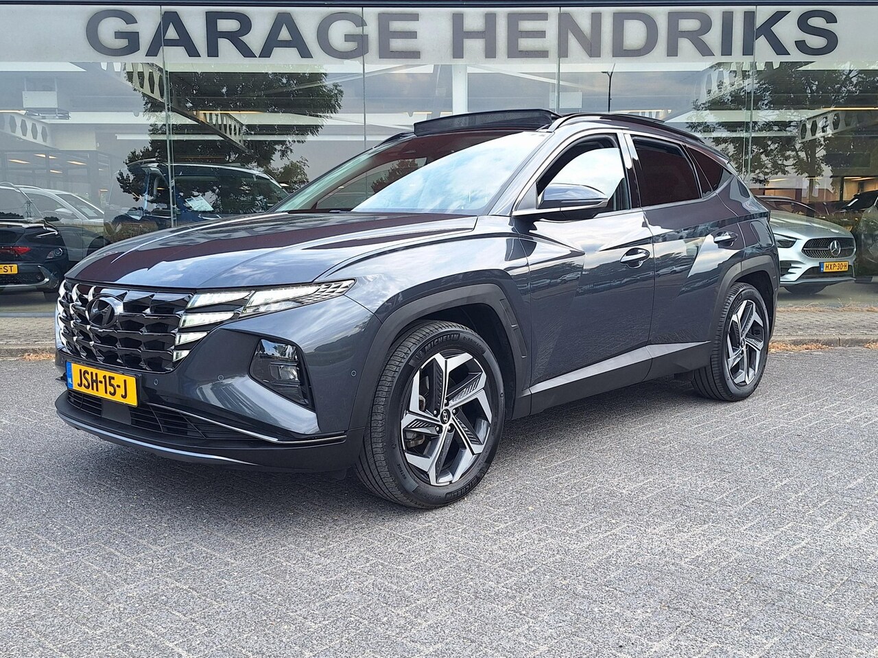 Hyundai Tucson - 1.6 T-GDI PHEV Premium Sky 4WD | Full Options! | Dealer onderhouden! | Trekhaak | Pano | L - AutoWereld.nl