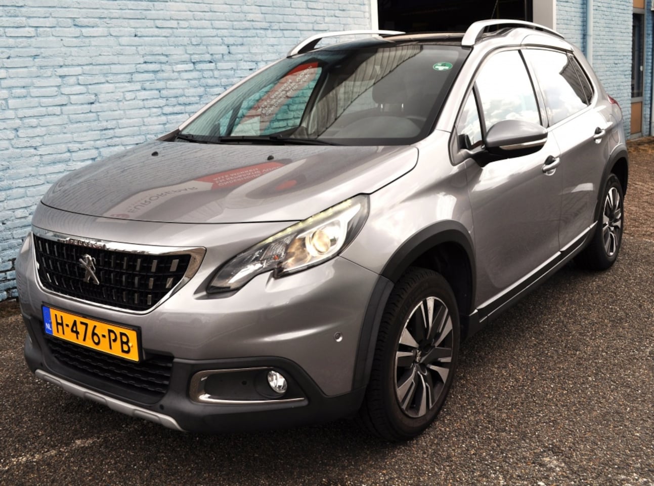 Peugeot 2008 - 1.2 Allure trh pano st.verw cam+aut park - AutoWereld.nl