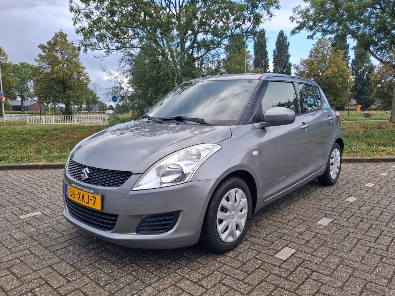 Suzuki Swift - 1.2 Summer EASSS 1.2 Summer EASSS - AutoWereld.nl