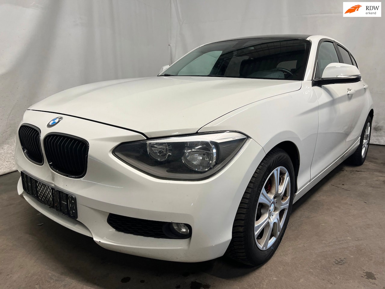 BMW 1-serie - 114i EDE Executive - Achterschade - Schade - AutoWereld.nl