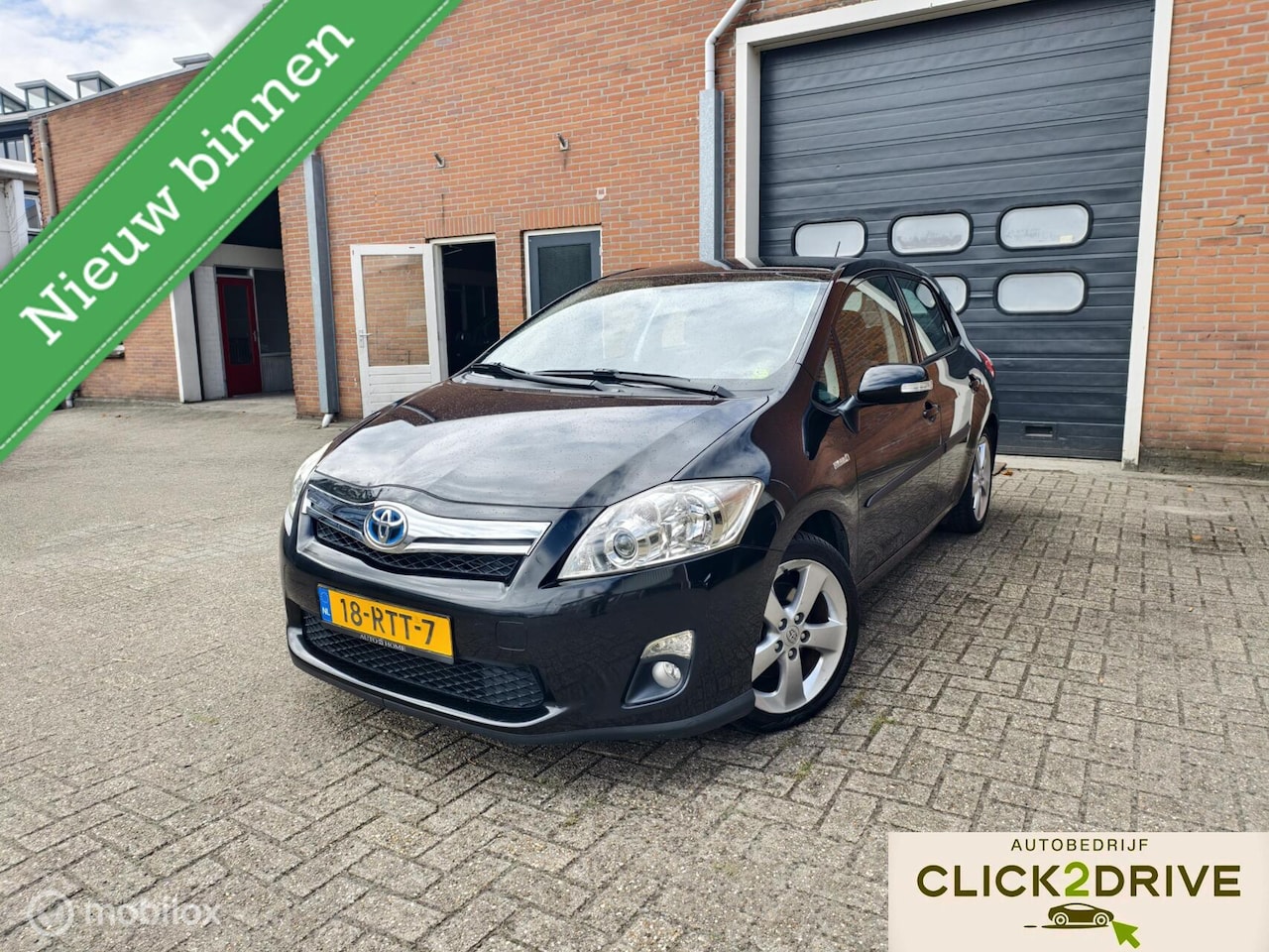 Toyota Auris - 1.8 Full Hybrid Executive 1.8 Full Hybrid Executive, NAP, keyless entry - AutoWereld.nl