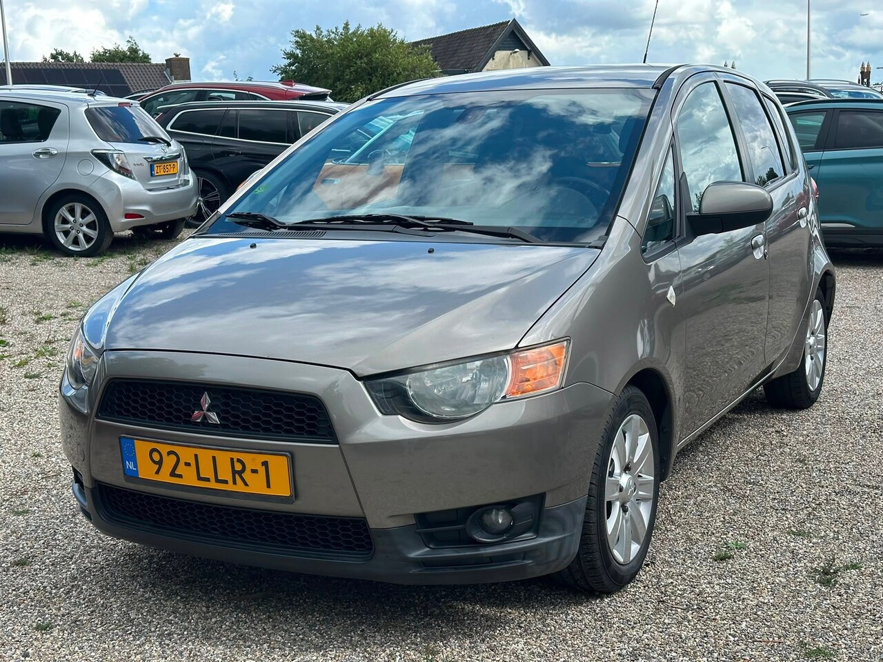 Mitsubishi Colt - 1.3 Edition Two 2e Eig Dealer Onderhouden Nieuwe Staat met Winterbanden Set - AutoWereld.nl