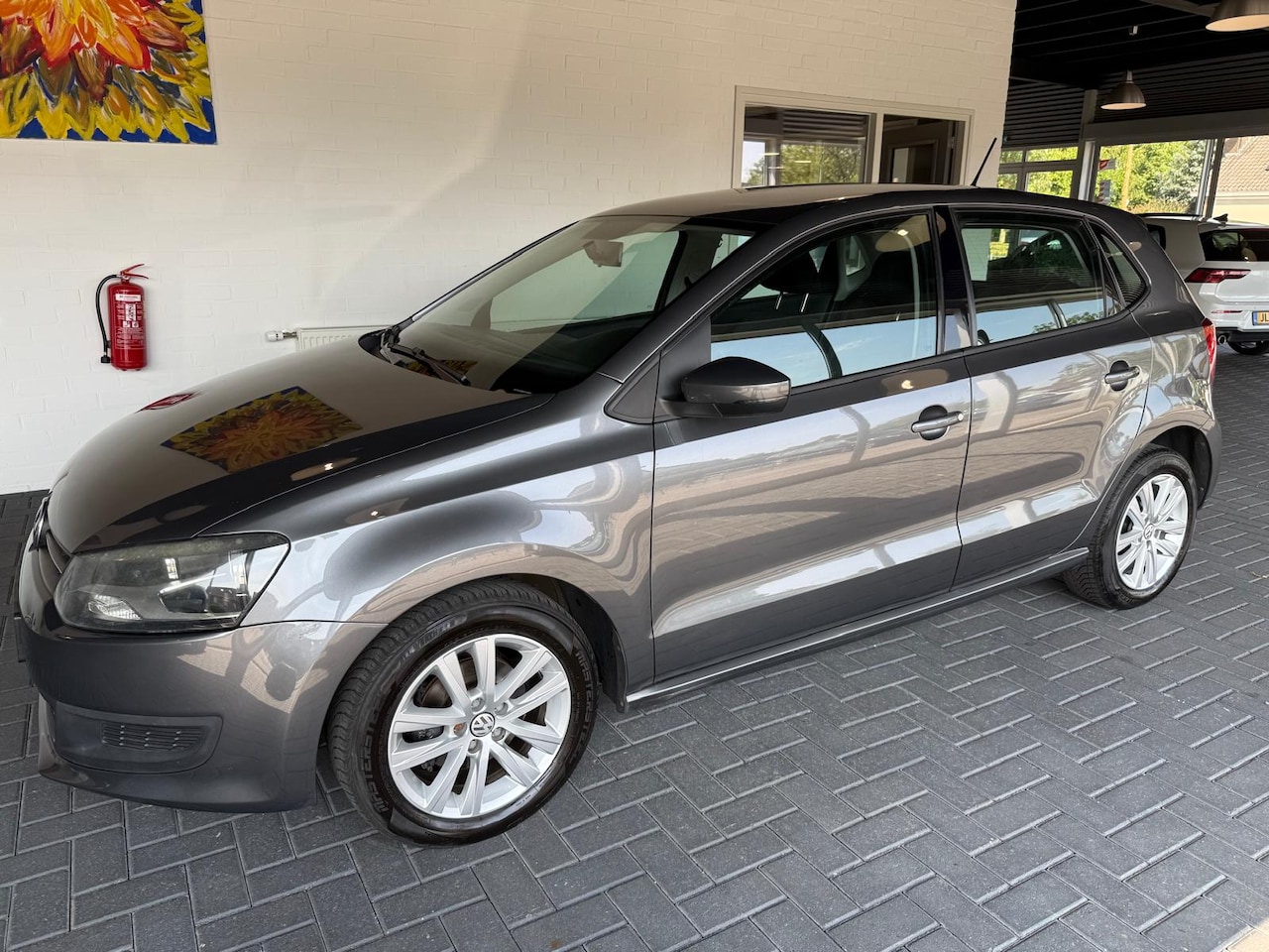 Volkswagen Polo - 1.2-12V Comfortline AIRCO/ CRUISE CONTROL/ALL SEASON BANDEN/LM VELGEN - AutoWereld.nl