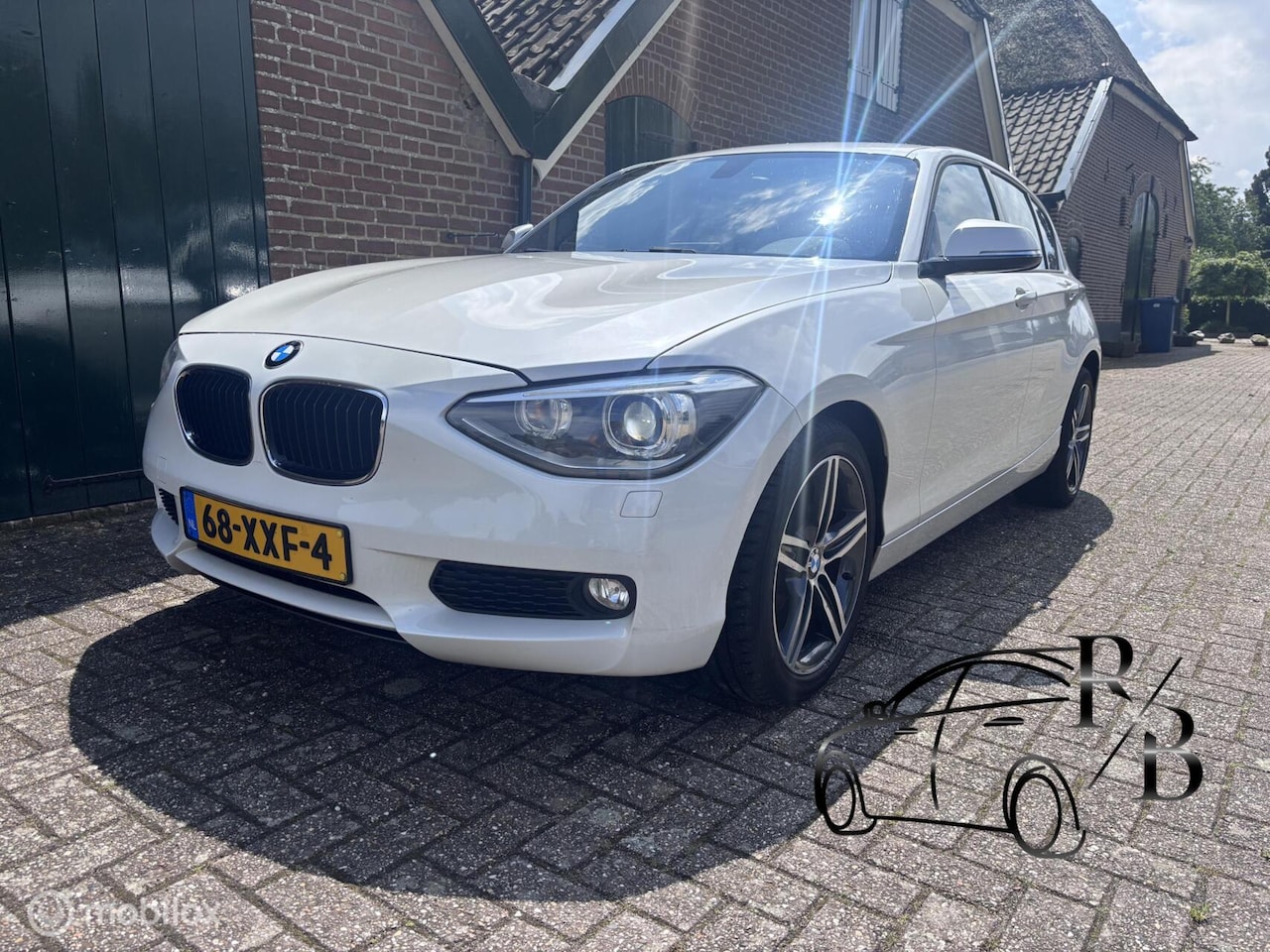 BMW 1-serie - 116i Upgrade Edition LEER NAVIGATIE - AutoWereld.nl
