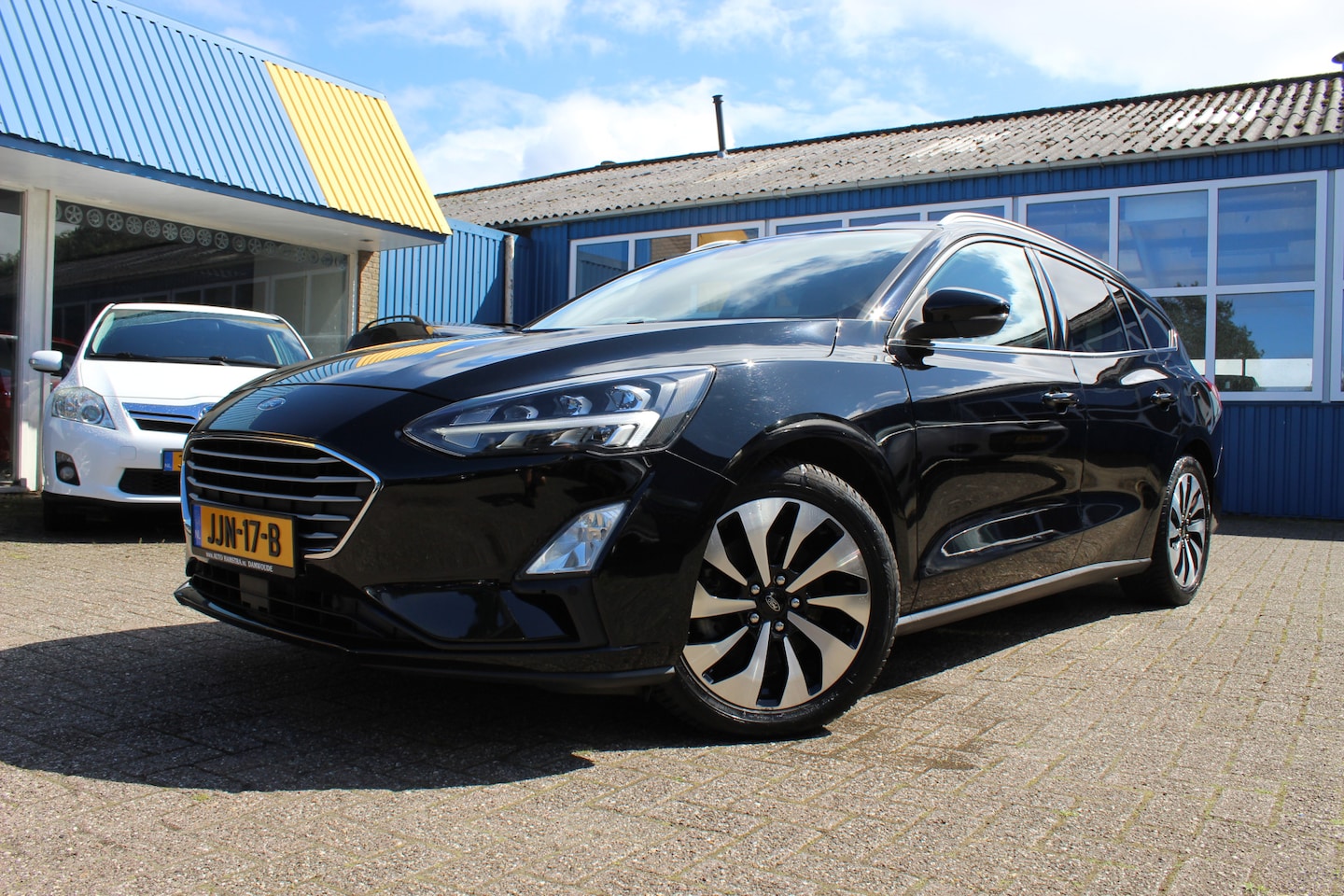 Ford Focus Wagon - 1.0i "Titanium Business" Cruise - Navi !!! 125 Pk - AutoWereld.nl