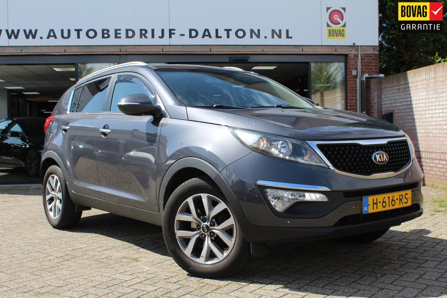 Kia Sportage - 1.6 GDI X-treme ComfortLine LEER / TREKHAAK / NAVIGATIE /CAMERA - AutoWereld.nl