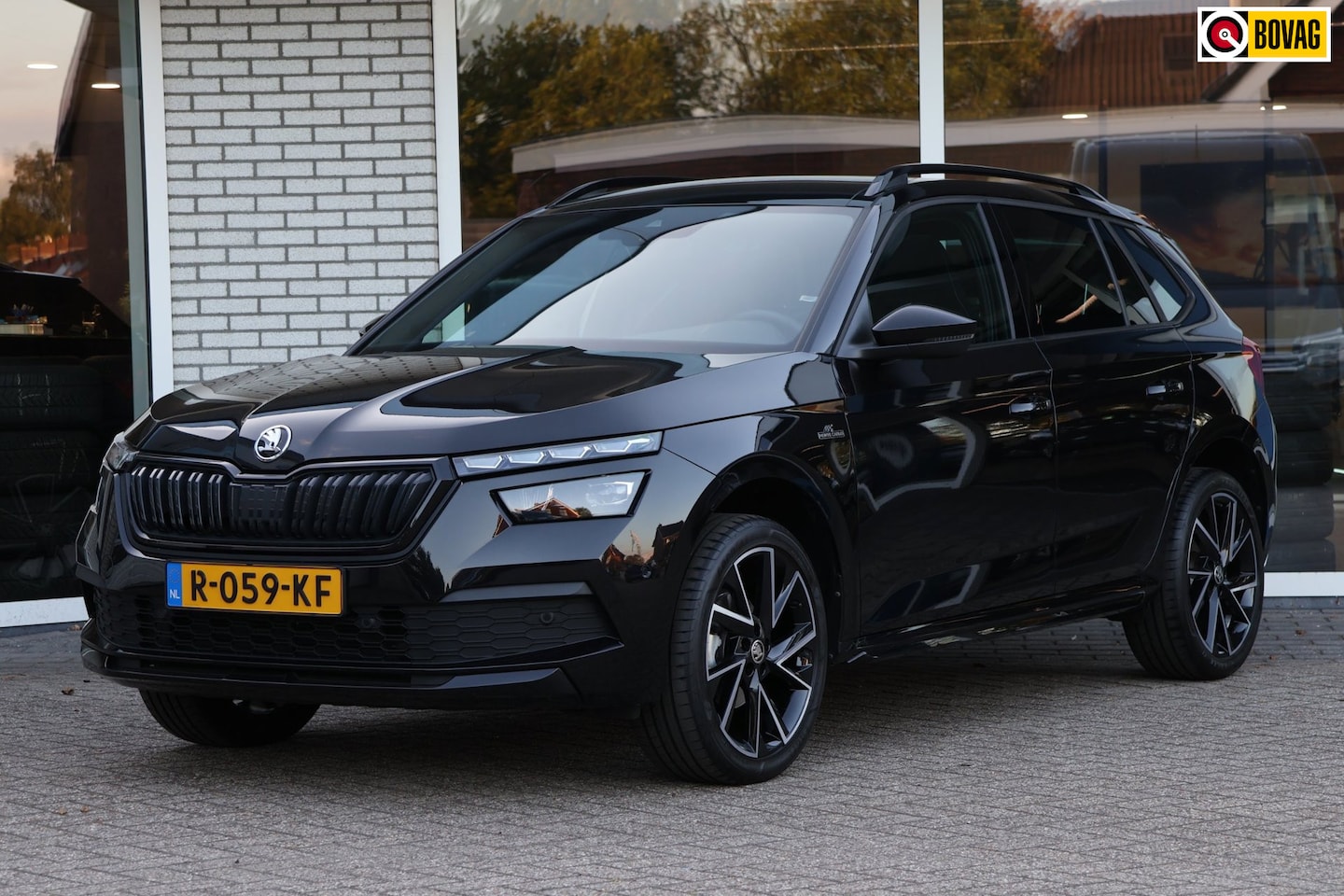 Skoda Kamiq - 1.0 TSI Monte Carlo Panoramadak Camera Trekhaak Stoelverwarming - AutoWereld.nl