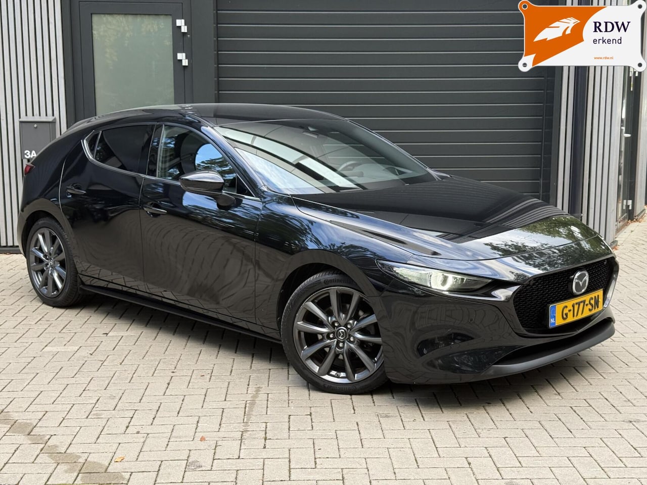 Mazda 3 - 2.0 e-SkyActiv-G M Hybrid 122 Luxury l Carplay Leer - AutoWereld.nl
