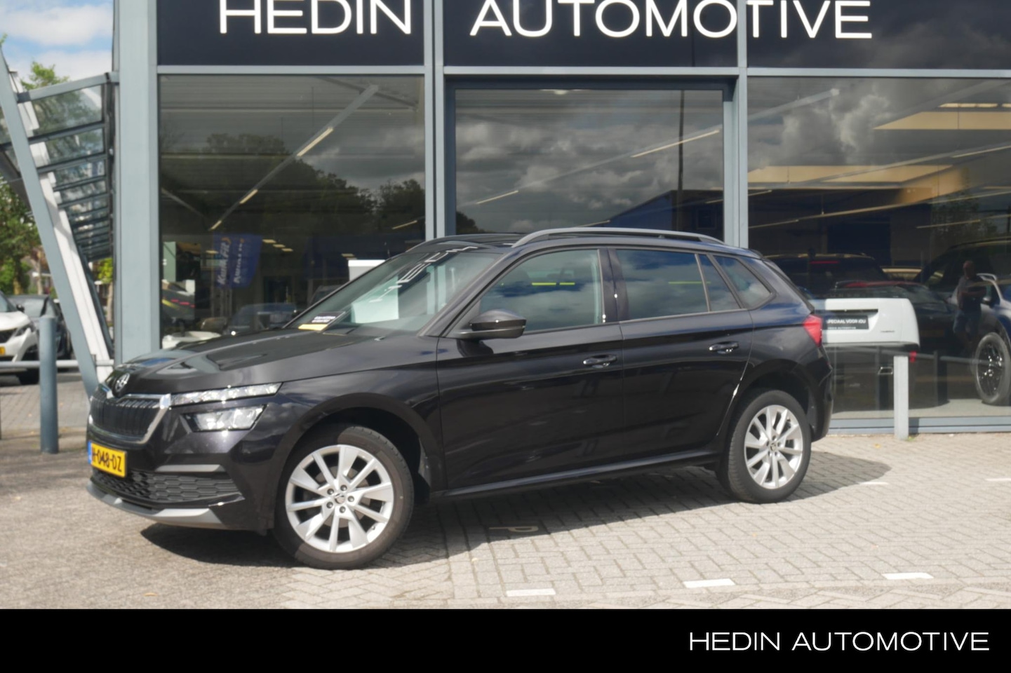 Skoda Kamiq - 1.0 TSI Sport Business | PDC Achter | All-Season banden | Apple Carplay/Android Auto | Nav - AutoWereld.nl