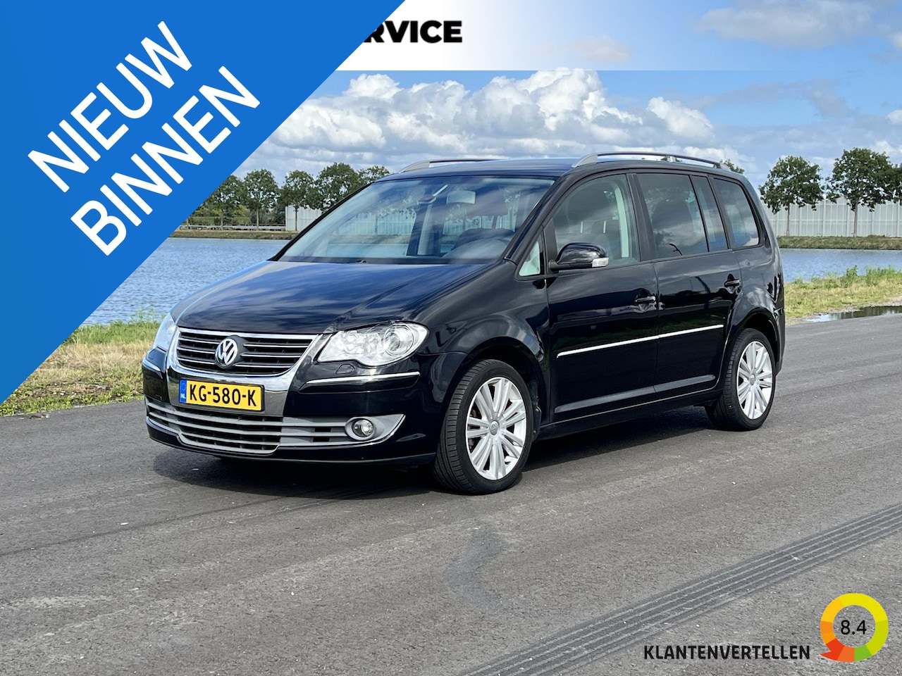 Volkswagen Touran - 1.4 TSI Highline Clima, cruise, stoelverwarming, pdc achter - AutoWereld.nl