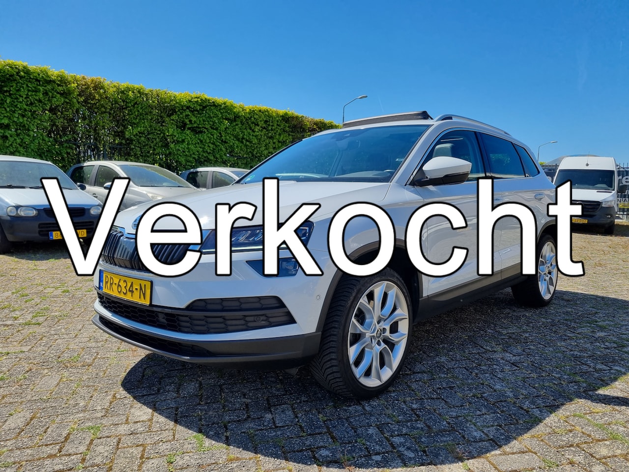 Skoda Karoq - 1.5 TSI ACT Style Business ✅PANODAK ✅CARPLAY ✅CANTON SOUND - AutoWereld.nl