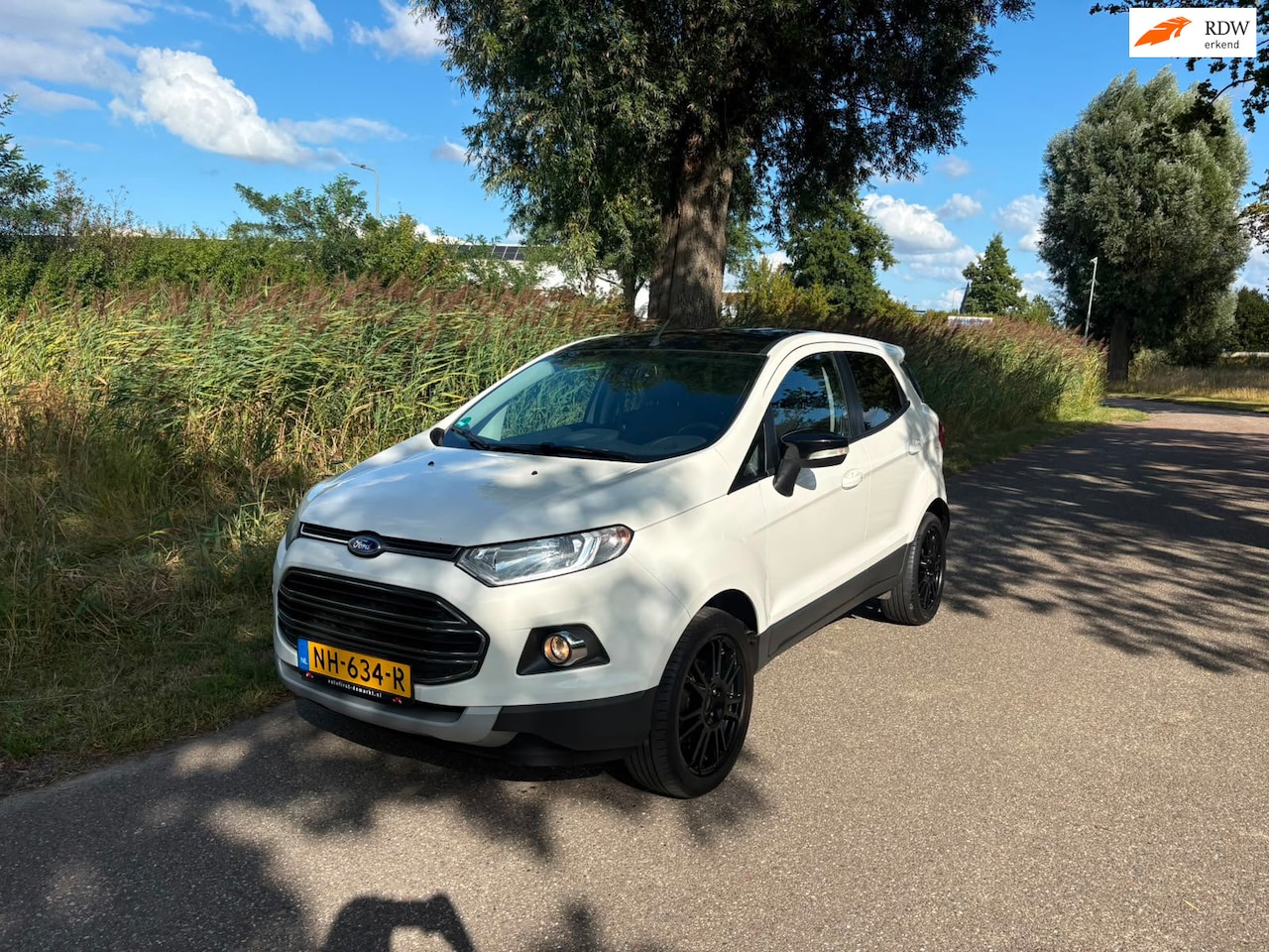 Ford EcoSport - 1.0 EcoBoost Titanium S Airco Cruise Navi Pdc Stoelverwarming Leder Bekleding - AutoWereld.nl