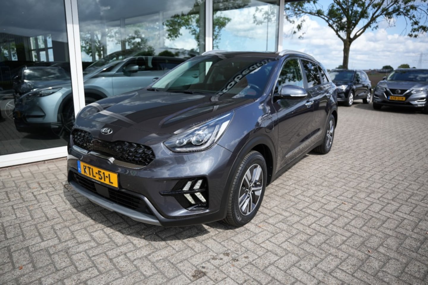 Kia Niro - 1.6 GDI PHEV EXECL.Pano,Trekhaak, Carplay, Navi, Camera - AutoWereld.nl