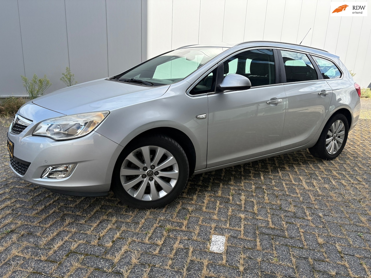 Opel Astra Sports Tourer - 1.4 Turbo Sport CLIMAT BJ 7-2012. APK. 8-2027 - AutoWereld.nl