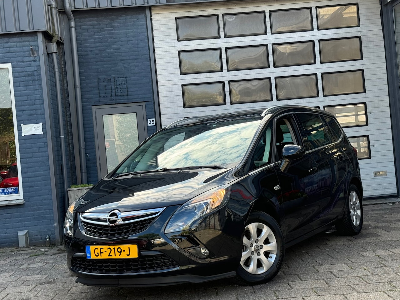 Opel Zafira Tourer - 1.4 Business+ 7P | Clima | Camera | Cruise | N.A.P - AutoWereld.nl