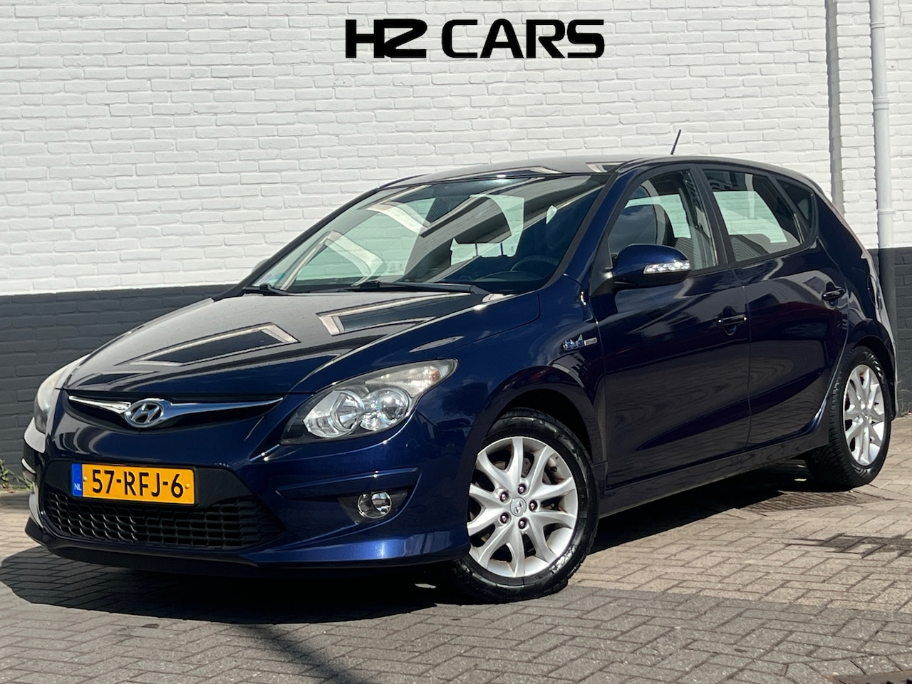 Hyundai i30 - 1.6i i-Motion|Nieuwe APK|Clima|Cruise|PDC|Elektr.pakket - AutoWereld.nl