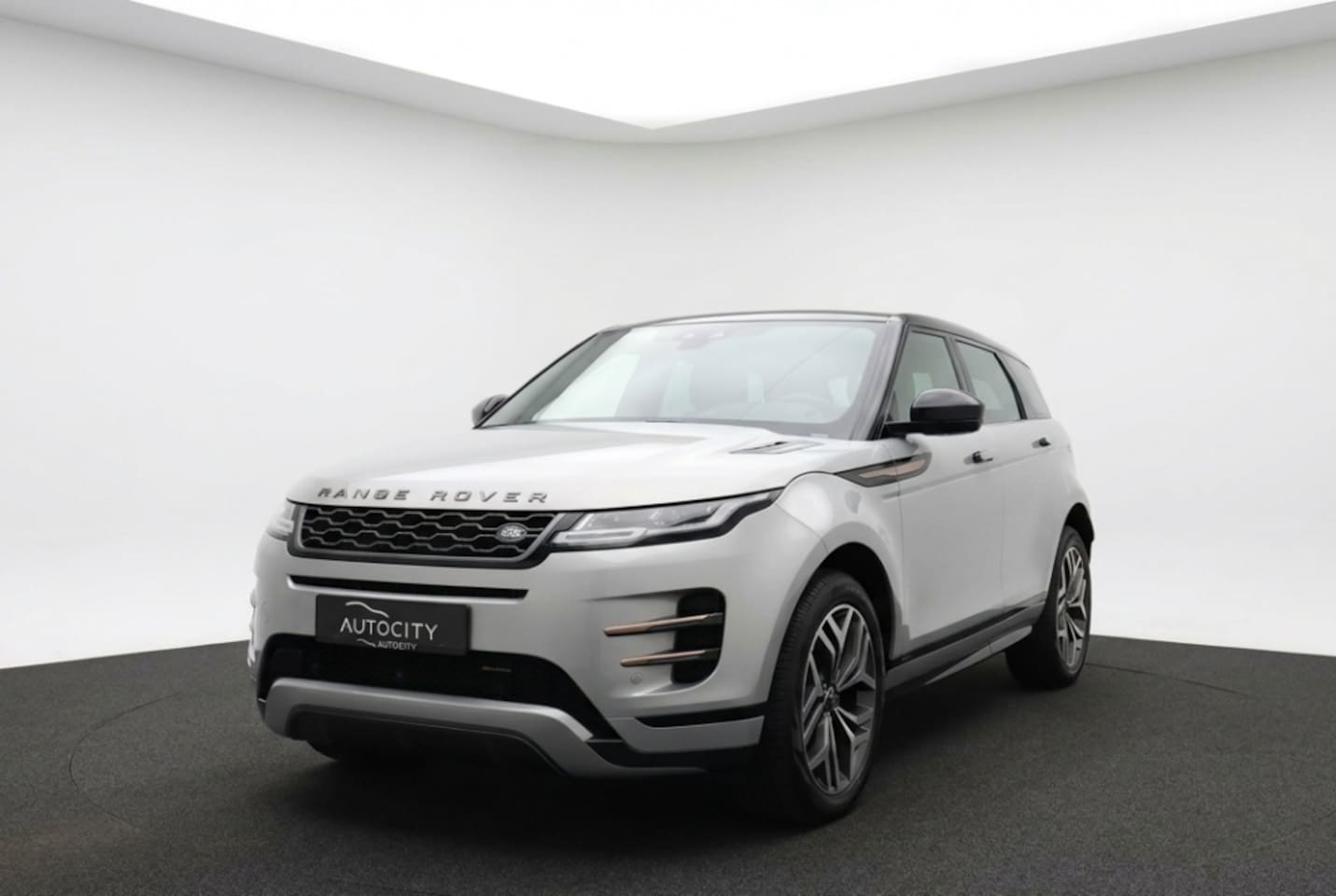 Land Rover Range Rover Evoque - 1.5 P300e AWD R-Dynamic HSE Pano | Leder | Meridian Sound | 20" - AutoWereld.nl