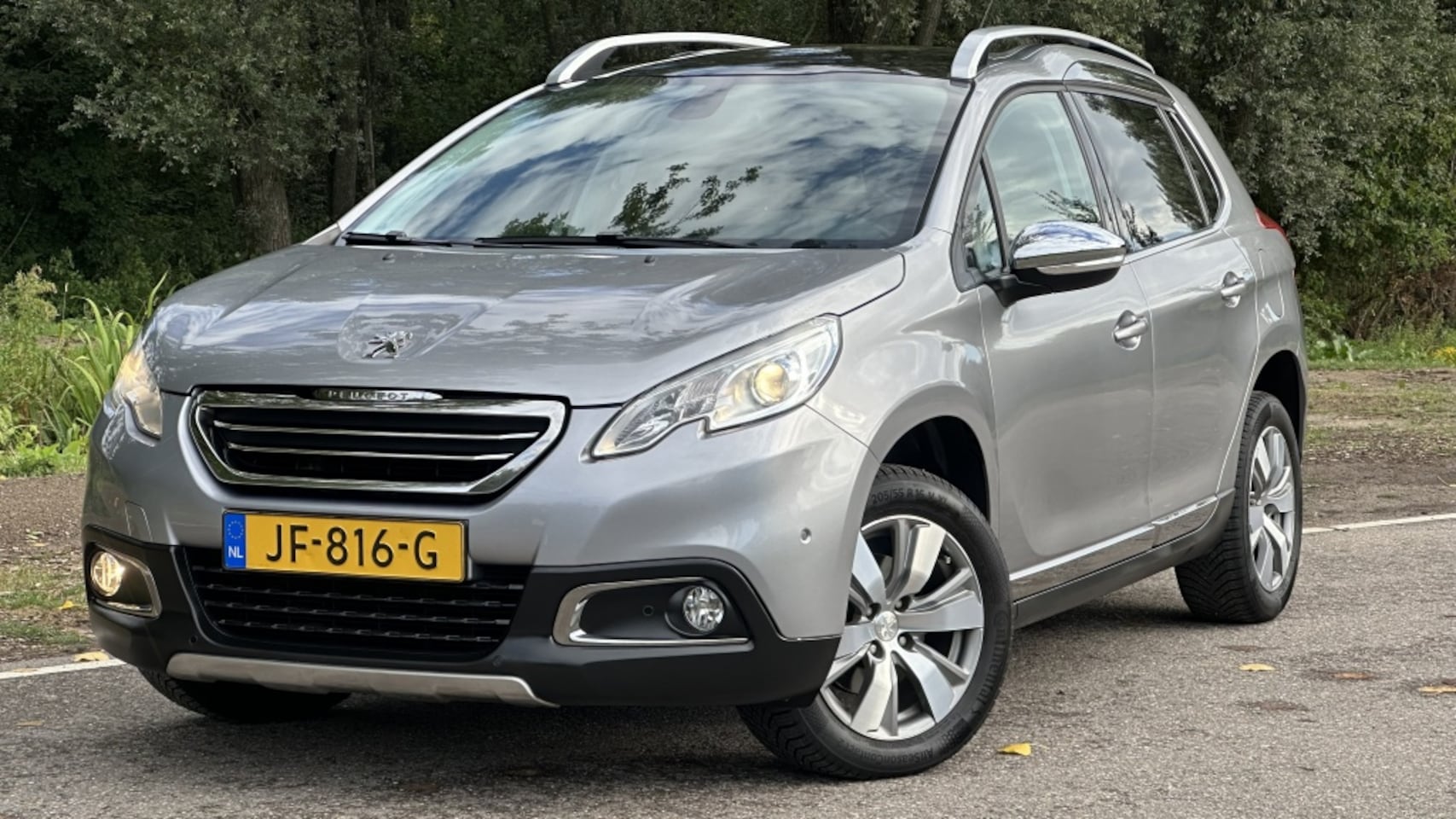 Peugeot 2008 - 1.2 Allure - Pano - Cruise - Park assist! - AutoWereld.nl