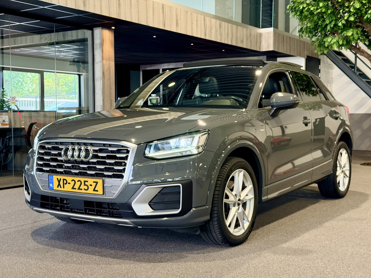 Audi Q2 - 1.4 TFSI CoD limited S-Line Panorama | Half leder | Navigatie | LED - AutoWereld.nl