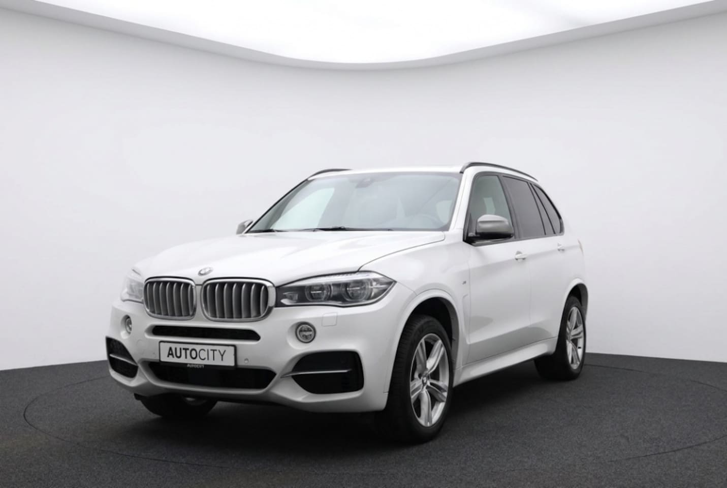 BMW X5 - M50d Pano l HUD l Harman l VOL OPTIES - AutoWereld.nl