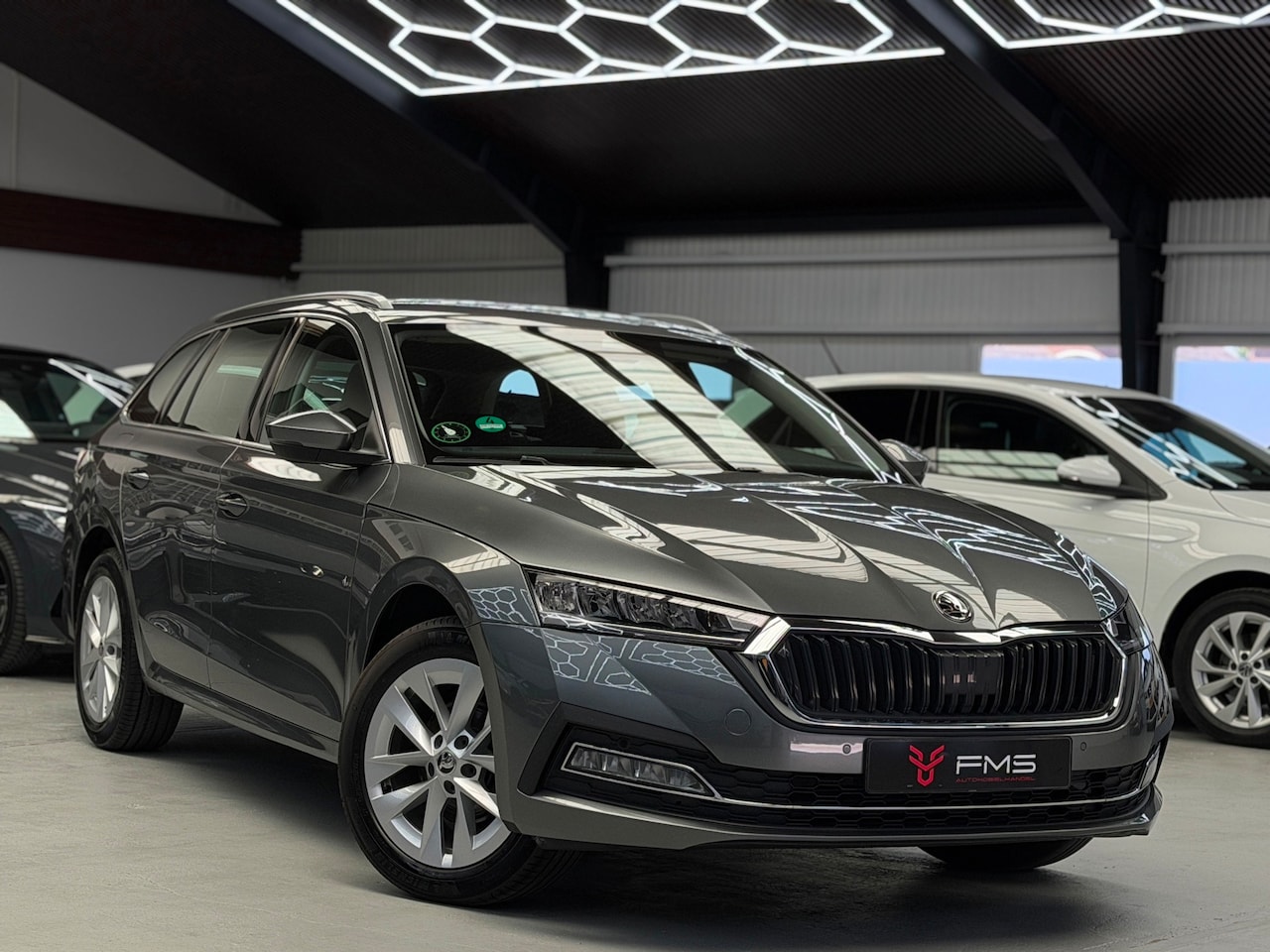 Skoda Octavia Combi - 1.5 e-TSI CarPlay Camera - AutoWereld.nl