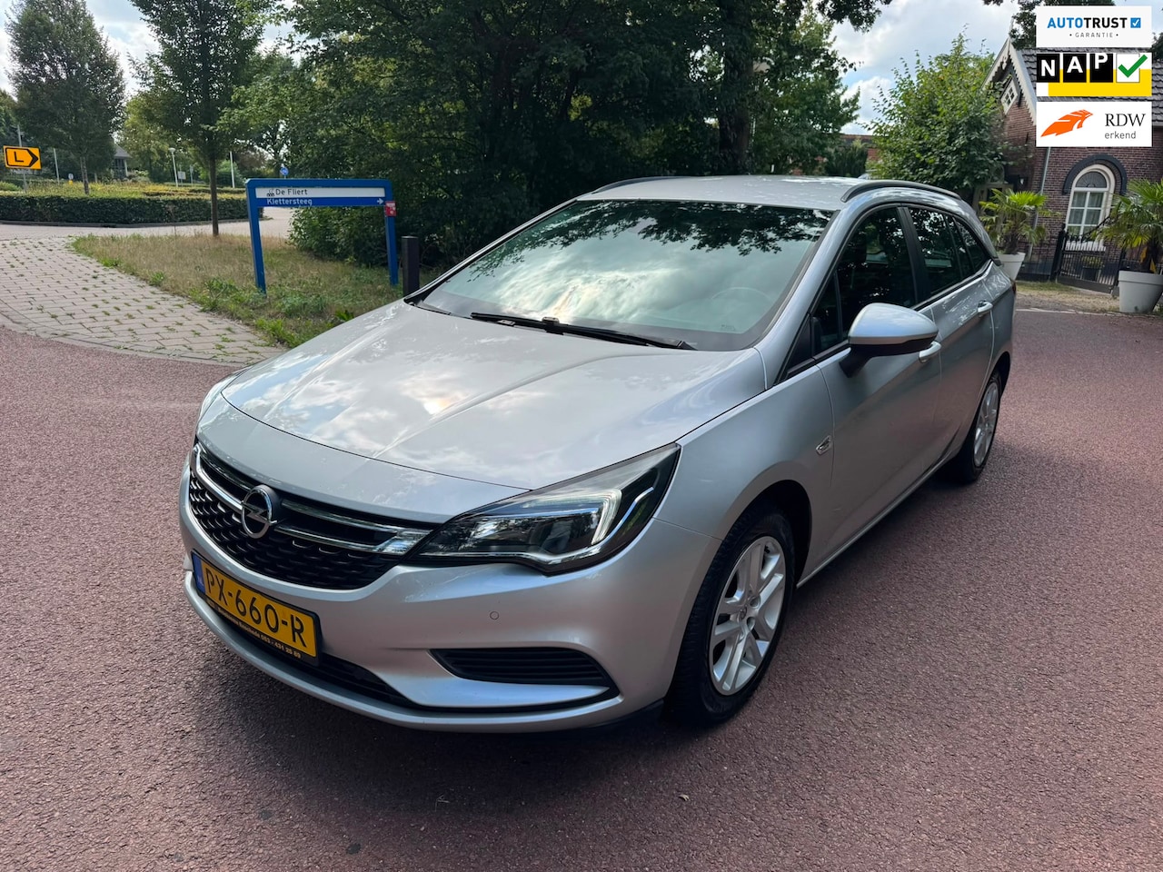 Opel Astra Sports Tourer - 1.0 Online Edition / Navi / Airco / NAP / pdc / Apk / Led / Aux - AutoWereld.nl