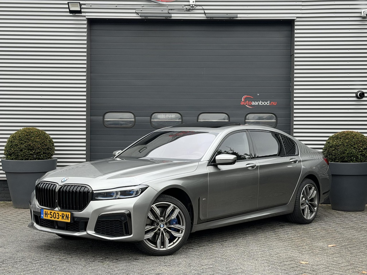 BMW 7-serie - 750Li xDrive High Executive M-Sport | Panoramadak | Sky Lounge | TV Schermen | Massage | B - AutoWereld.nl