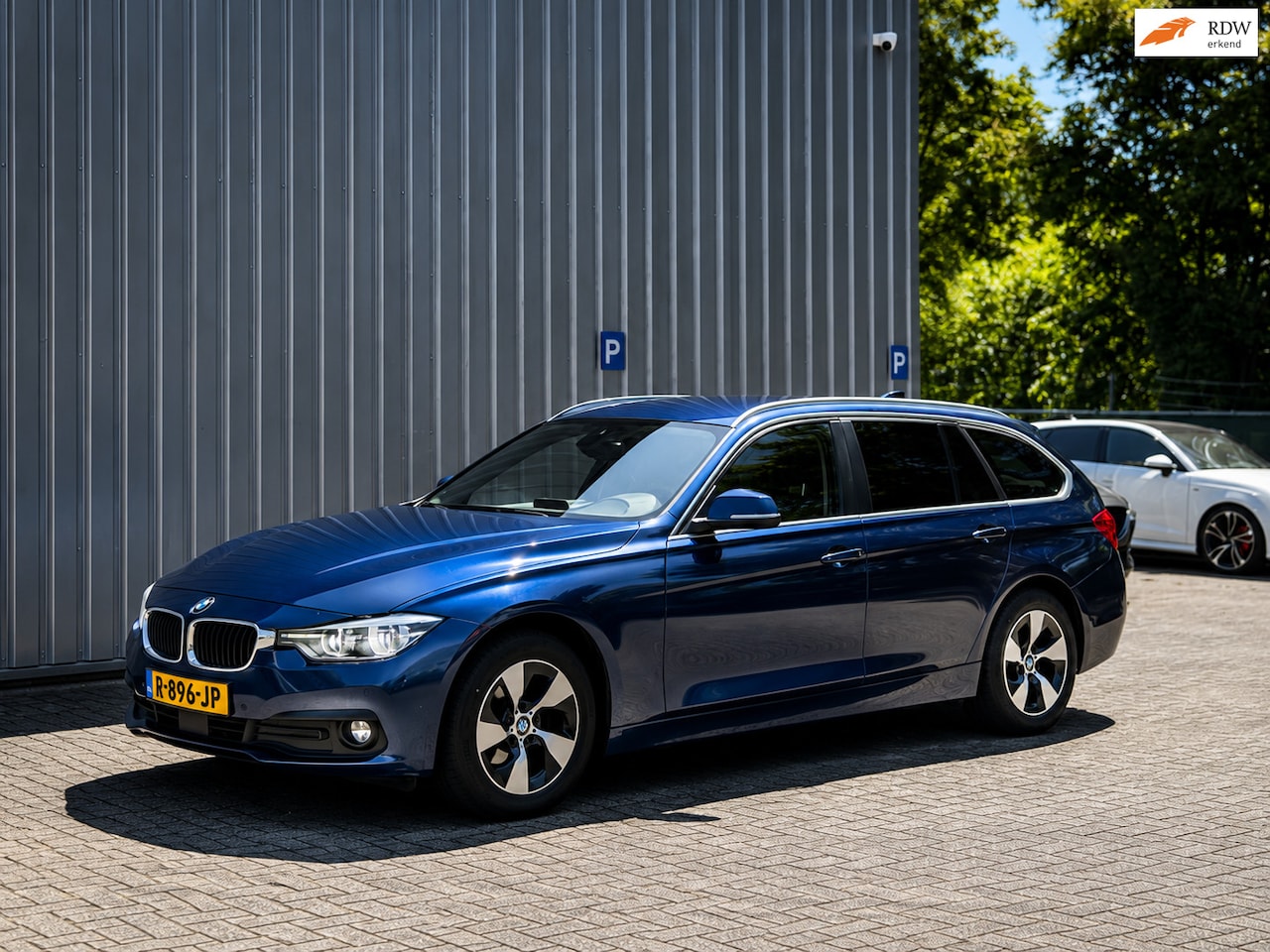 BMW 3-serie Touring - 320d High Executive / Adaptive Cruise / Sportinterieur! - AutoWereld.nl