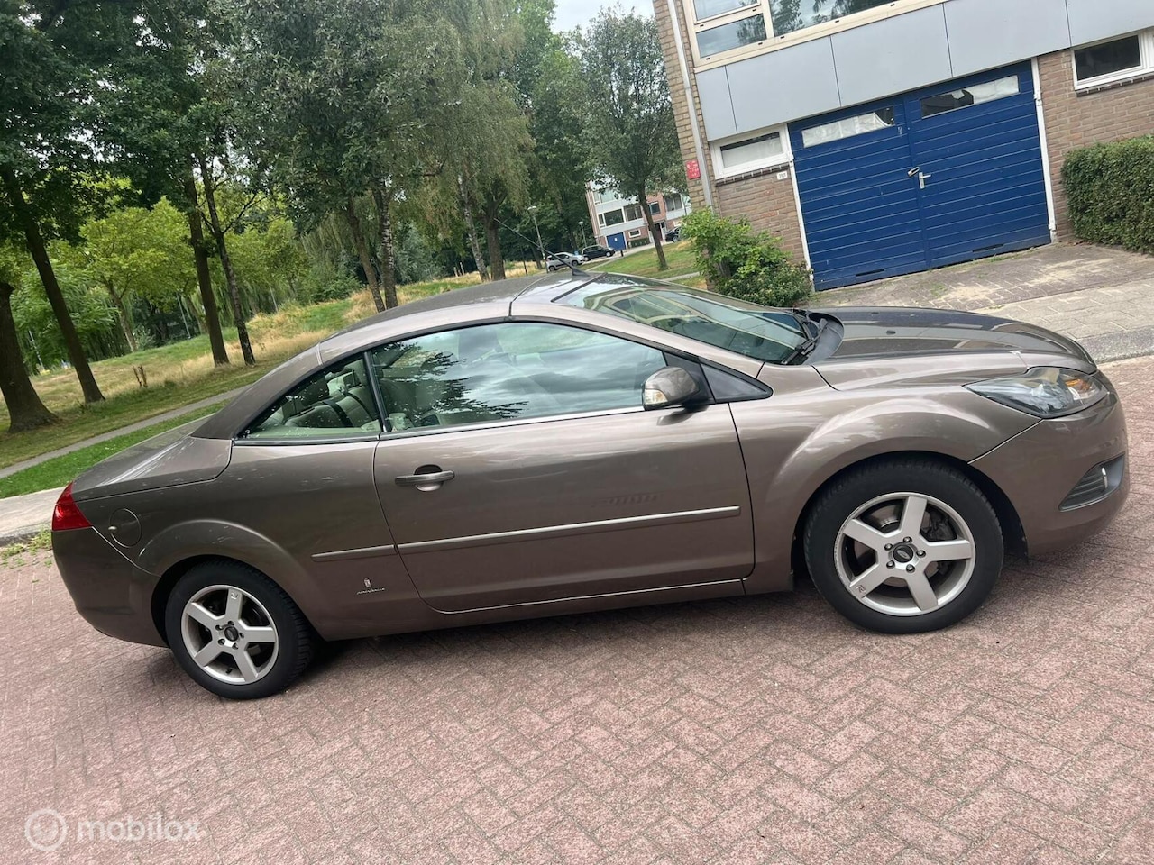Ford Focus - 2.0 Ghia 2.0 Ghia - AutoWereld.nl