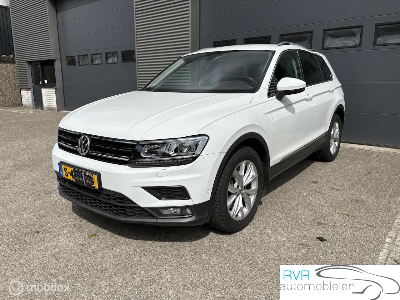 Volkswagen Tiguan - 2.0 TSI 4Motion Highline / DAKSCHADE - AutoWereld.nl