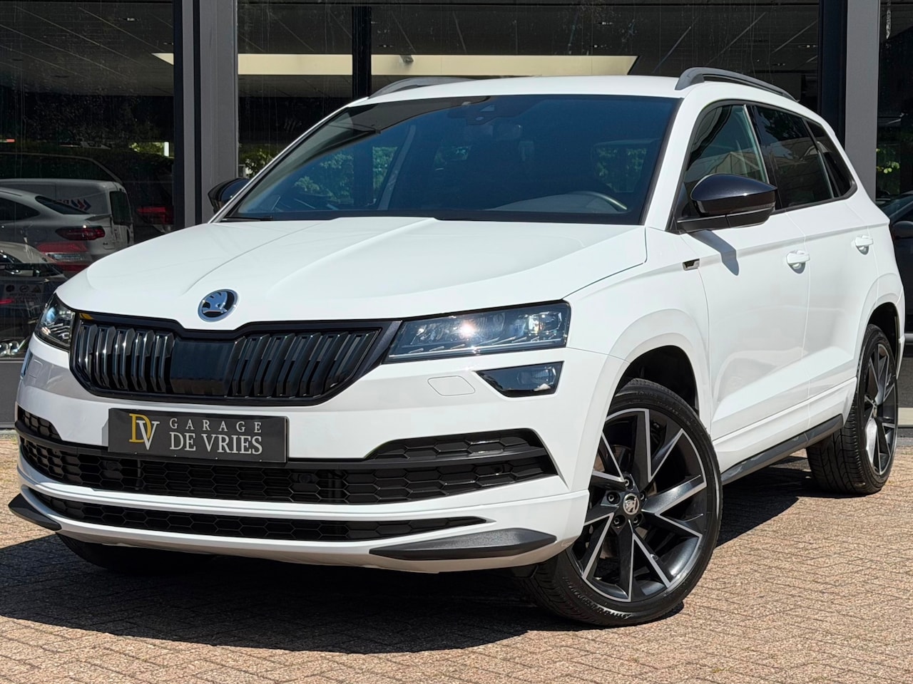 Skoda Karoq - 2.0 TSI 4x4 Sportline ACC Virtual Full Option 2000KG Trekgewicht Garantie - AutoWereld.nl