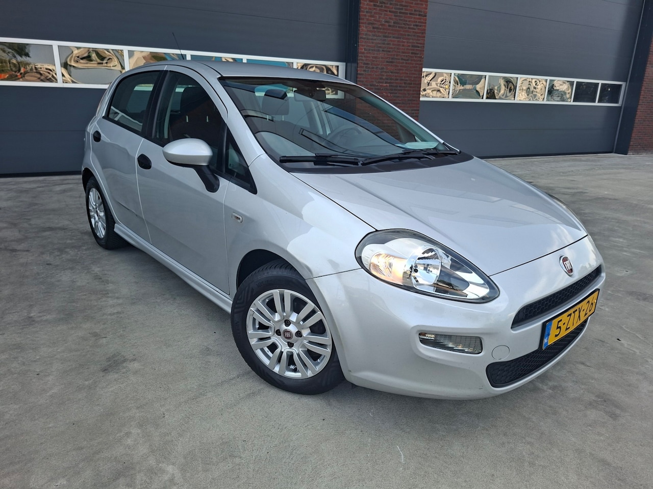 Fiat Punto Evo - 1.3 M-Jet Street 5 deurs Airco/LMV APK 6-2027 - AutoWereld.nl