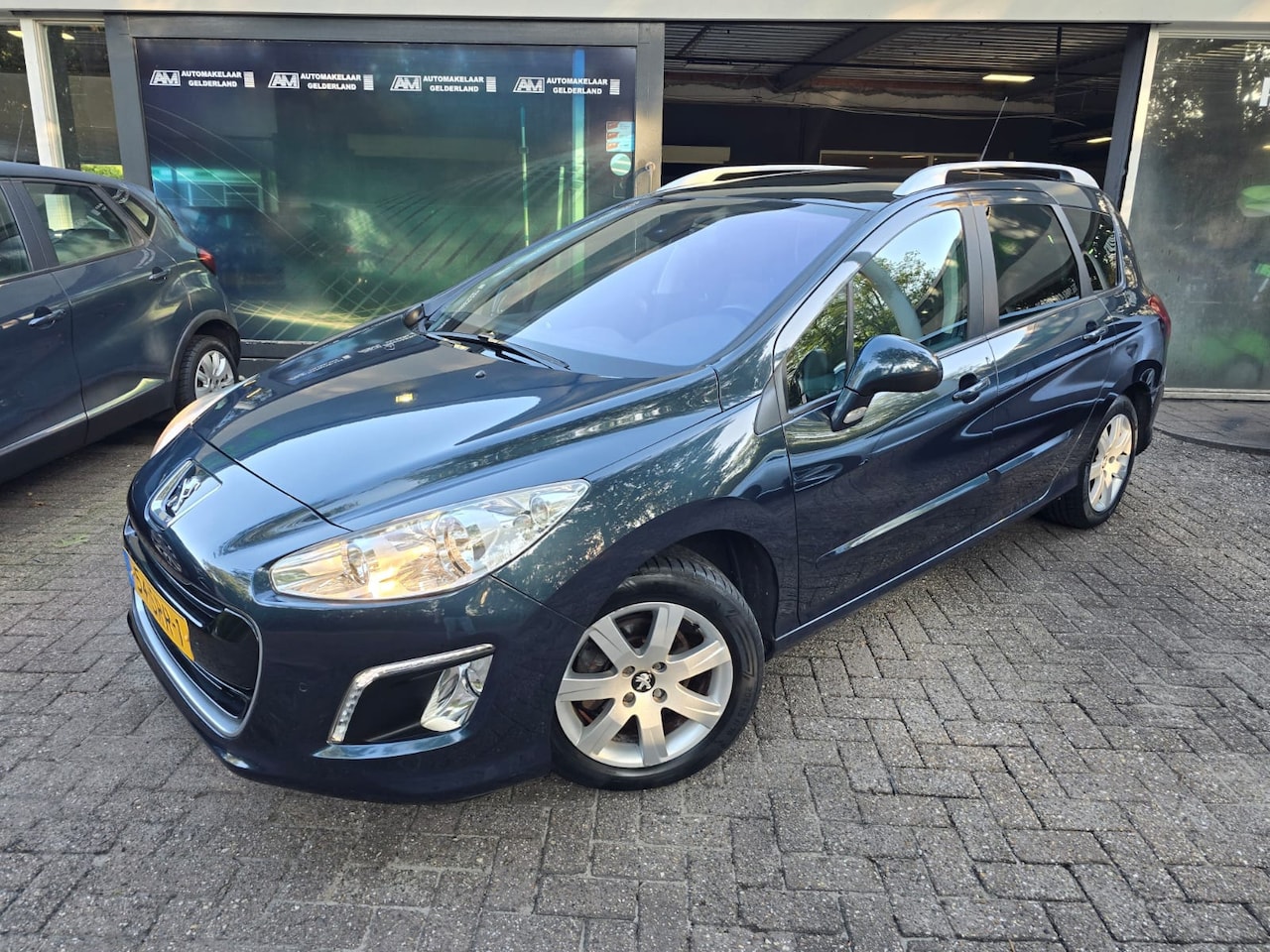 Peugeot 308 SW - 1.6 VTi Active | AUTOMAAT | 2E EIGENAAR | 3/6 OF 12MND GARANTIE | PANO DAK | PDC | AIRCO | - AutoWereld.nl