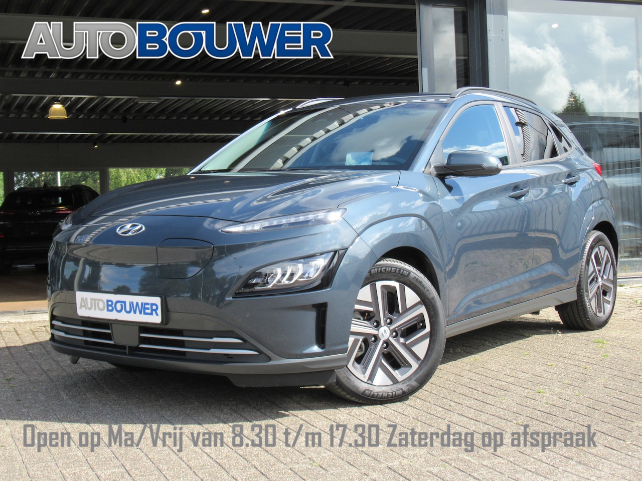 Hyundai Kona Electric - EV Premium 64 kWh | 3 fase | warmtepomp 1e eigen | full option! | leder | head-up | elektr - AutoWereld.nl