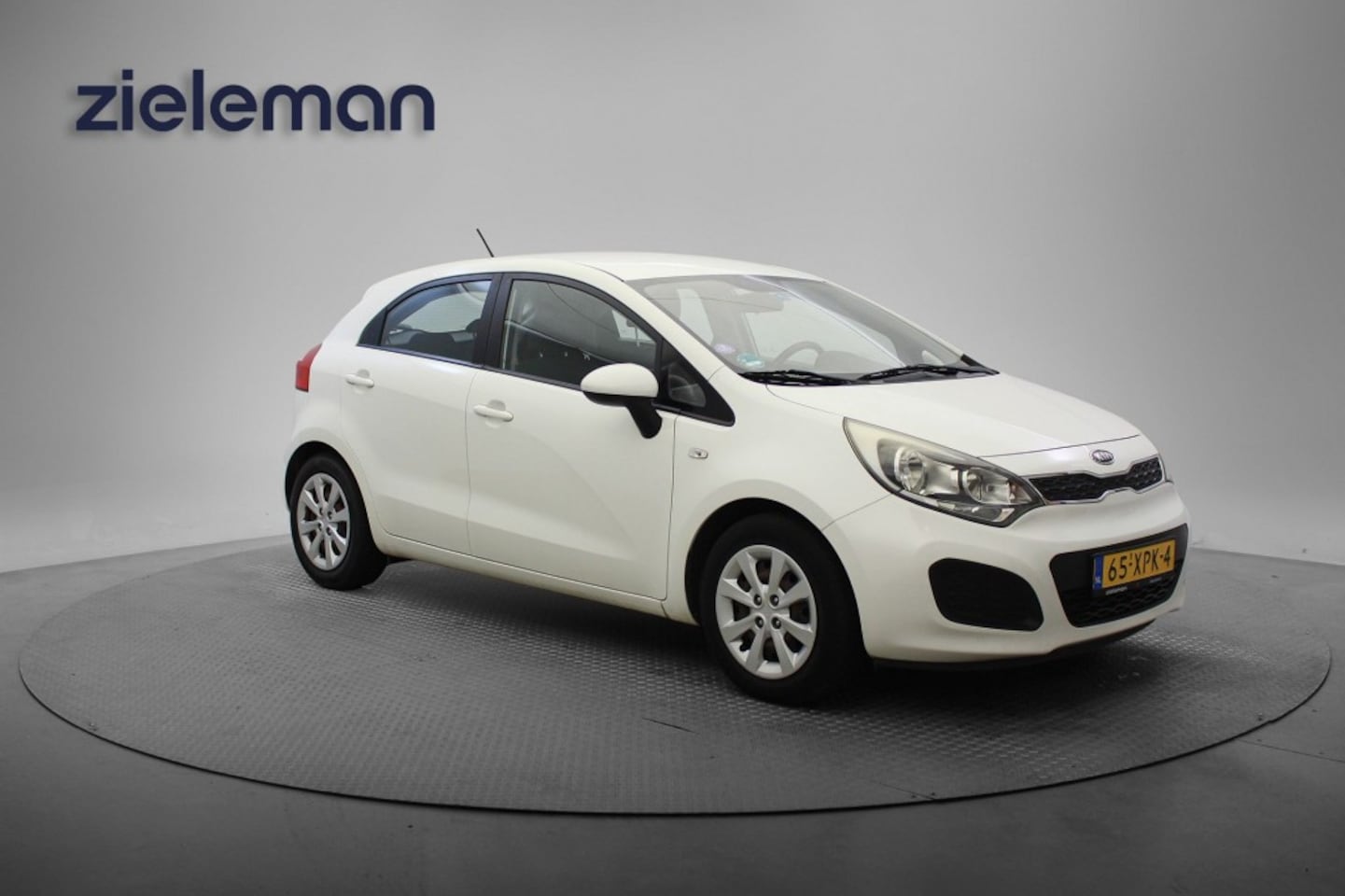 Kia Rio - 1.2 CVVT Comfort Pack - Airco, Cruise, Multifunctioneel Stuur - AutoWereld.nl