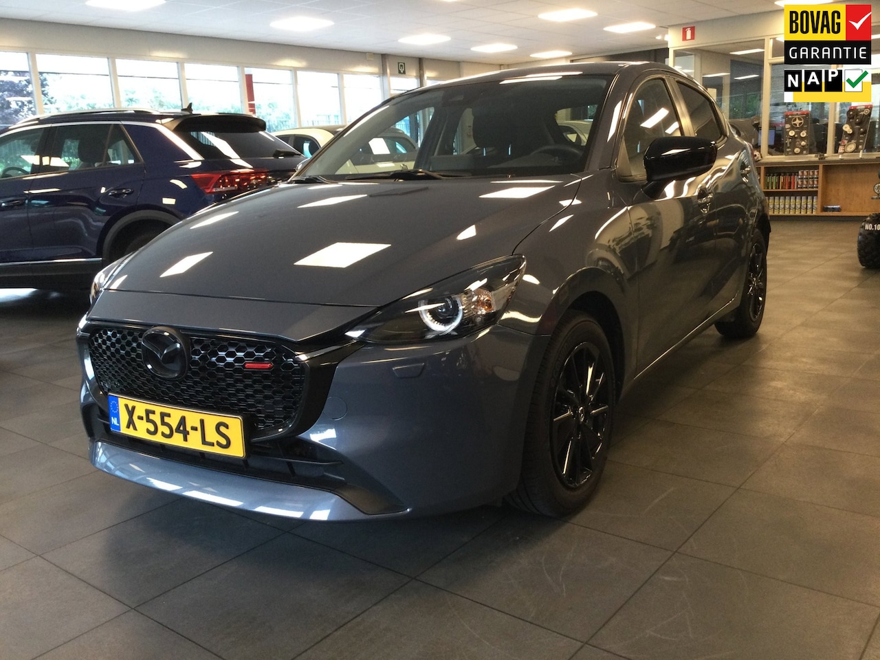 Mazda 2 - 1.5 e-SkyActiv-G 90 Homura Camera-PDC-Stuurverwarming-Stoelverwarming-LED-Carplay - AutoWereld.nl