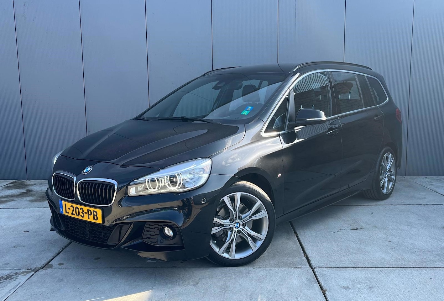 BMW 2-serie Gran Tourer - 218i 7p. High Executive M-Sport | Lederen Bekleding | Stoel Verwarming | Trekhaak | - AutoWereld.nl
