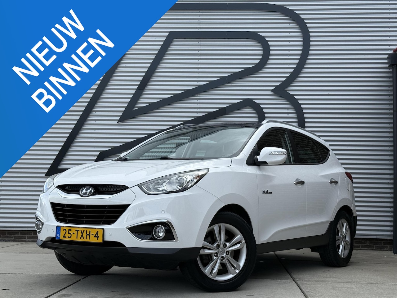 Hyundai ix35 - 1.6i GDI Style 2e Eigenaar|Schuifdak|Trekhaak|Clima|Cruise|PDC V+A|N.A.P|APK tot 12-2026 - AutoWereld.nl