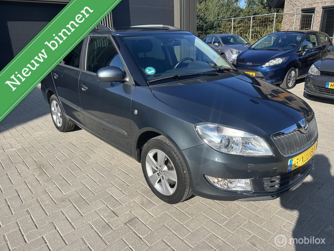 Skoda Fabia Combi - 1.2 TSI Drive Trekh Navi Clima - AutoWereld.nl