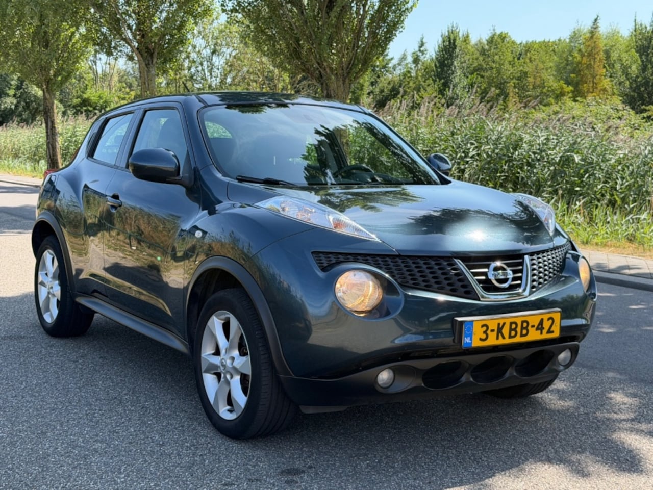 Nissan Juke - 1.6 Acenta *1e eigenaar, volledig dealer-onderhouden!* - AutoWereld.nl